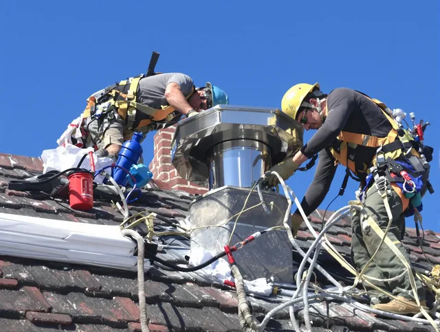 Protective chimney cap installed by Boca Raton Chimney Sweep in Boca Raton, FL