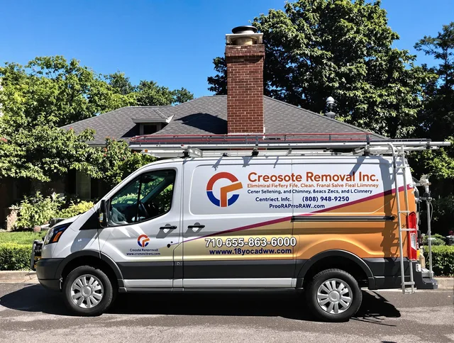 Boca Raton Chimney Sweep technician removing creosote safely in Boca Raton, FL