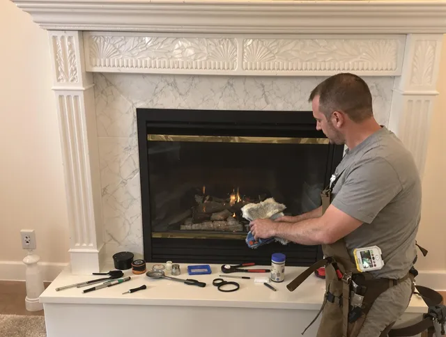 Boca Raton Chimney Sweep performing fireplace maintenance in Boca Raton, FL